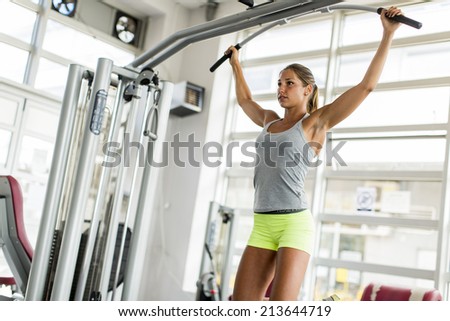 Pretty young woman training in the gym Pretty young woman training in the gym