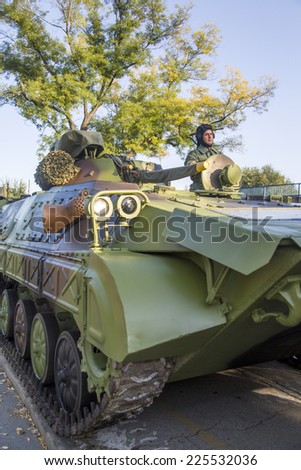 BELGRADE, SERBIA, OCTOBER 10, 2014: Unidentified soldier in Infantry Fighting Vehicles of Serbian Armed Forces. He is preparing for parade marking 70th anniversary of Belgrade liberation in WWII.