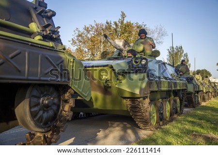BELGRADE, SERBIA, OCTOBER 10, 2014: Unidentified soldiers in Infantry Fighting Vehicles of Serbian Armed Forces. They are preparing for parade marking 70th anniversary of Belgrade  liberation in WWII.