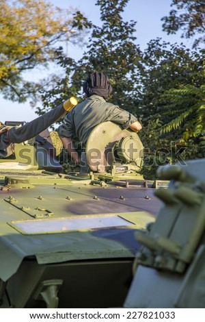BELGRADE, SERBIA, OCTOBER 10, 2014: Unidentified soldier in Infantry Fighting Vehicle of Serbian Armed Forces. He is preparing for parade marking 70th anniversary of Belgrade  liberation in WWII.