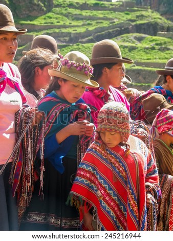 PISAC, PERU - MARCH 5, 2006: Unidentified people at Inca citadel in Sacred Valley near Pisac in Peru. Sacred Valley of the Incas in Southern Sierra that contains many famous and beautiful Inca ruins