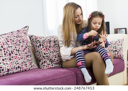 Mother and daughter in the room