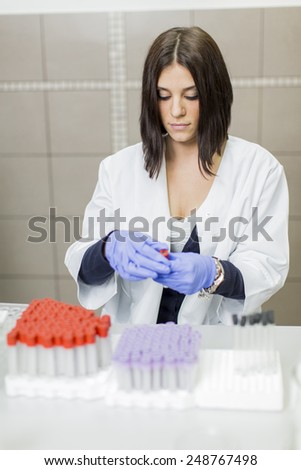 Young woman in the medical laboratory