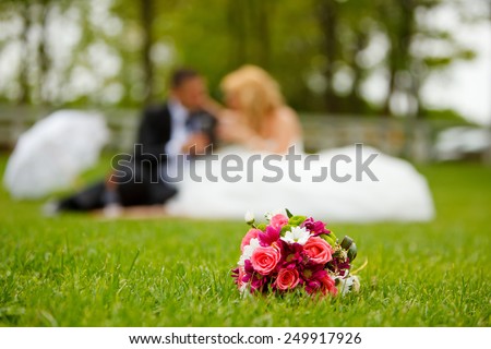 Wedding couple and flower bouquet
