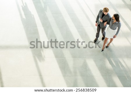 Young man and woman in the office