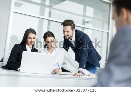 Young people working in the office