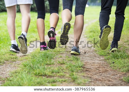 Group of young people training in the park
