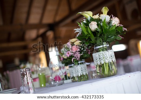 Close view of the floral wedding decoration on a table