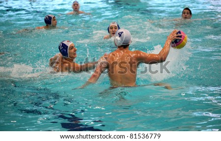 NOVI SAD, SERBIA - JULY 1: Unidentified players at a waterpolo match between Vojvodina and Partizan in Novi Sad, Serbia on July 1, 2011.