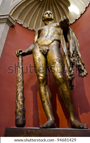 VATICAN - OCTOBER 14: Gilded bronze statue of Hercules in Vatican Museum at October 14, 2011. Statue was discovered in 1864 near the Theatre of Pompey. It is Roman bronze of early 2nd century.