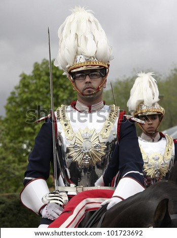 MADRID - MAY 5: Royal guards on horses. Ceremony of the Oath of Allegiance of the Royal Guards at El Pardo Palace on May 4, 2012 in Madrid