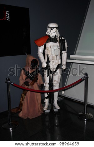MADRID - MARCH 28: Jawa and Storm Trooper. Star Wars exhibition during the presentation of the new Star Wars game for Kinect XBOX 360 at the Sports Palace on March 28, 2012 in Madrid