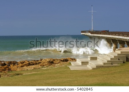 water spray caused by strong winds and high tide