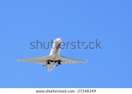 under view of a passenger aeroplane coming into land