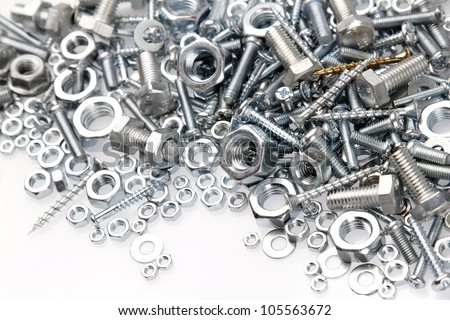 Nuts And Bolts On Plain Background Stock Photo 105563672 : Shutterstock