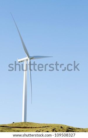 Giant wind turbine on hill