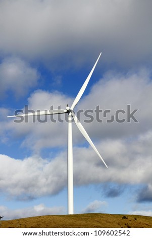 Giant wind turbine on hill