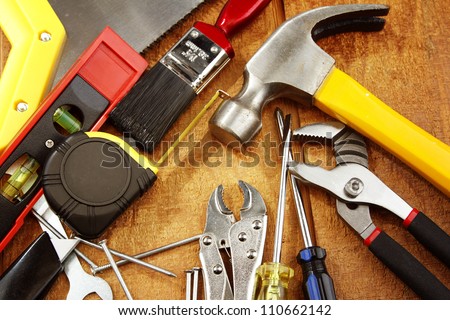 Assorted work tools on wood
