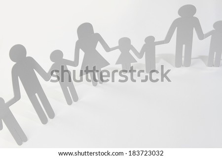 Paper doll family holding hands