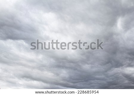 Dark ominous grey storm clouds. Dramatic sky