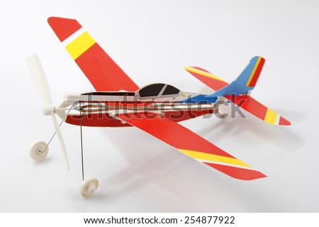 Toy model plane on plain background