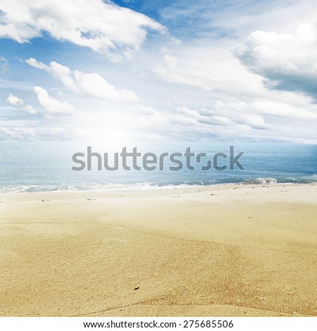 Sand, water and sky beach scenery