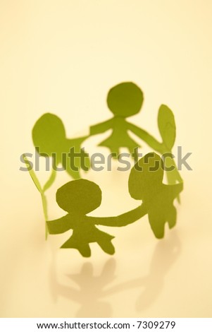 Paper-chain people in a circle holding hands