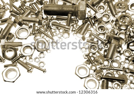 Nuts and bolts over white