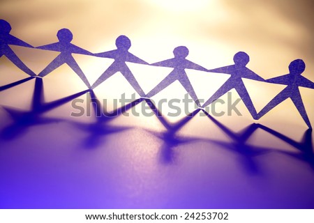 Paper-chain people holding hands