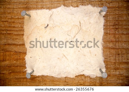 Piece of paper nailed to board