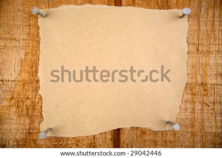 Piece of paper nailed to board