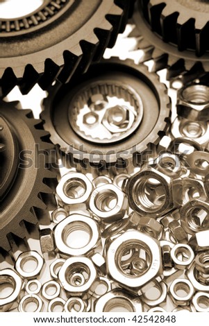 Steel gears and nuts close-up