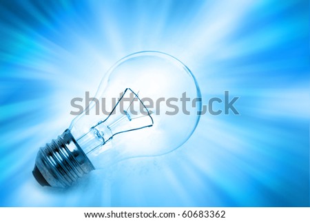 Light bulb on bright background