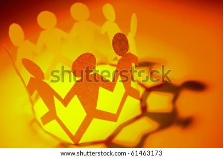 Group of people holding hands in a circle