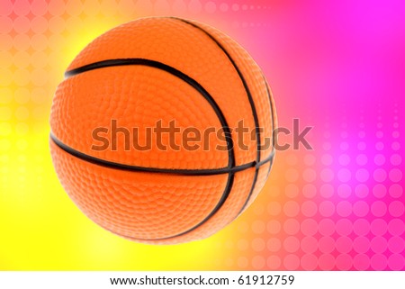 Basketball on yellow and pink color background