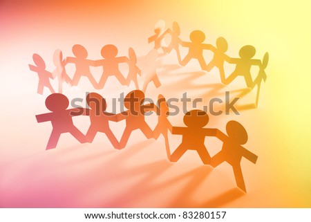 Teams of people holding hands