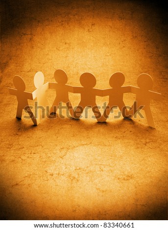Group of six people holding hands