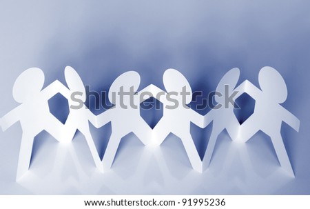 Paper chain people holding hands