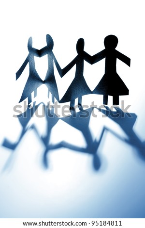 Female paper dolls holding hands