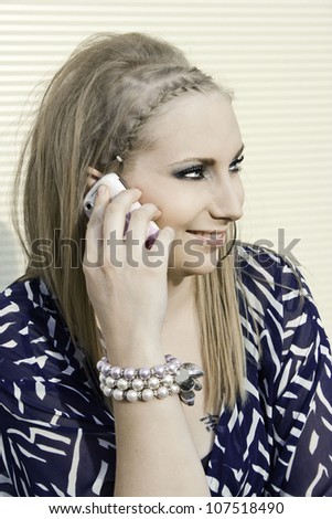 Beautiful young woman on phone.