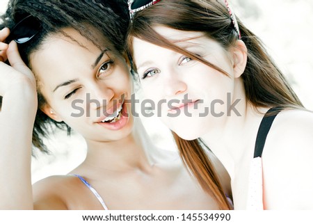 Portrait of two women laughing