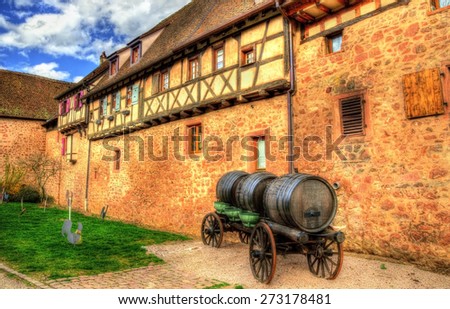 Cart with wine barrels in Riquewihr - Alsace, France