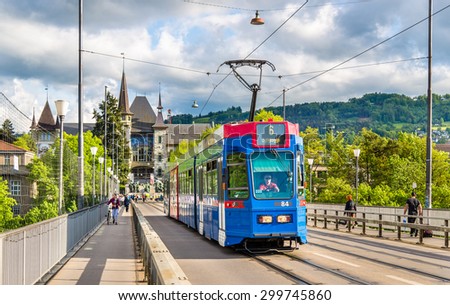 BERN, SWITZERLAND - MAY 09: Be 4/10 tram on Kirchenfeldbrucke in Bern on May 9, 2015. There are 9 trams of this class in Bern.