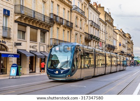 BORDEAUX, FRANCE - JUNE 12: Alstom Citadis 402 tram on June 12, 2015 in Bordeaux, France. This section is powered by a safe ground-level power supply
