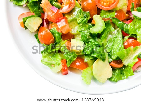 Salad from fresh vegetables with an olive oil on a white background , saved clipping path