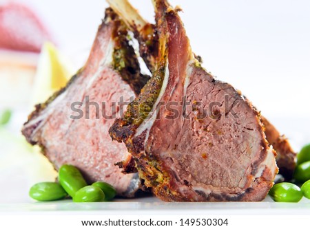 Stewed mutton with green string bean on a white plate