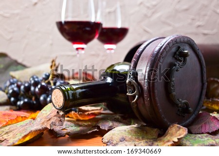 bottle with wine in old wooden case
