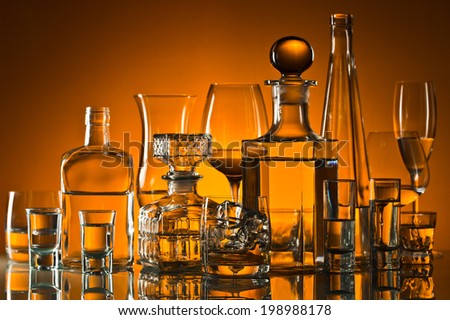 alcoholic drinks in bar on glass table
