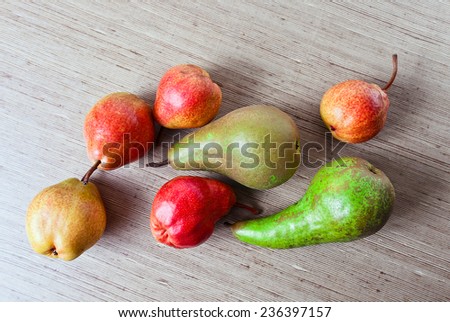 Juicy ripe pears on a wooden table
