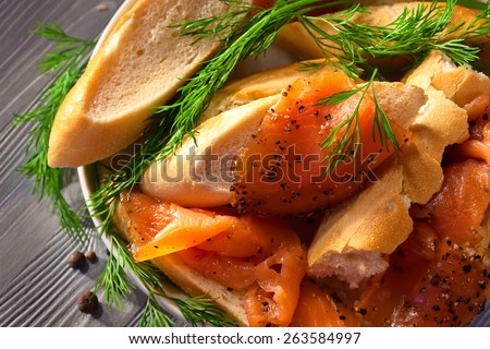 smoked salmon with bread , dill and pepper